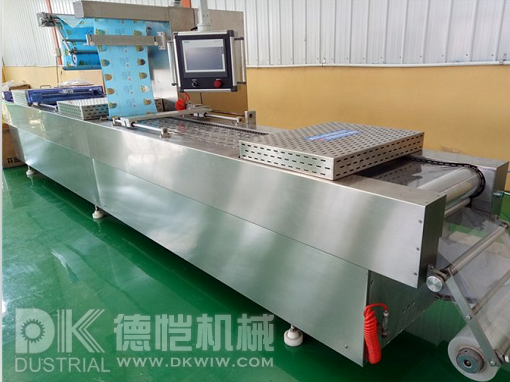 電動(dòng)拉伸自動(dòng)包裝機